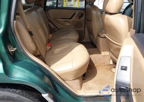 1999 Jeep Grand Cherokee Laredo z USA, uszkodzony, nr VIN 1J4G258S7XC564419